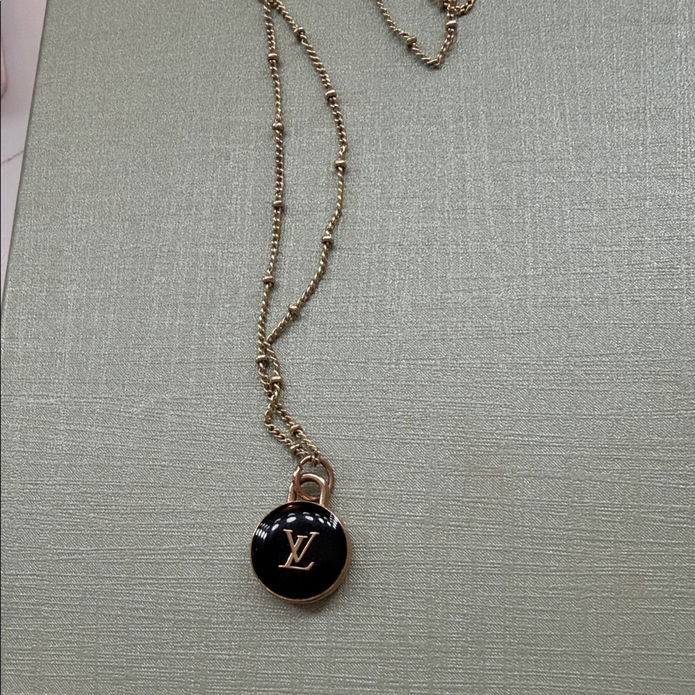 Gold and Black Pendant Necklace